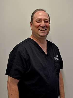 John G. Fletcher, DMD | Periodontal Treatment, Implant Dentistry and Emergency Treatment