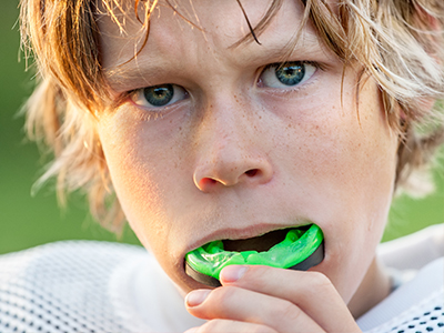 John G. Fletcher, DMD | Pediatric Dentistry, Sports Mouthguards and Oral Cancer Screening
